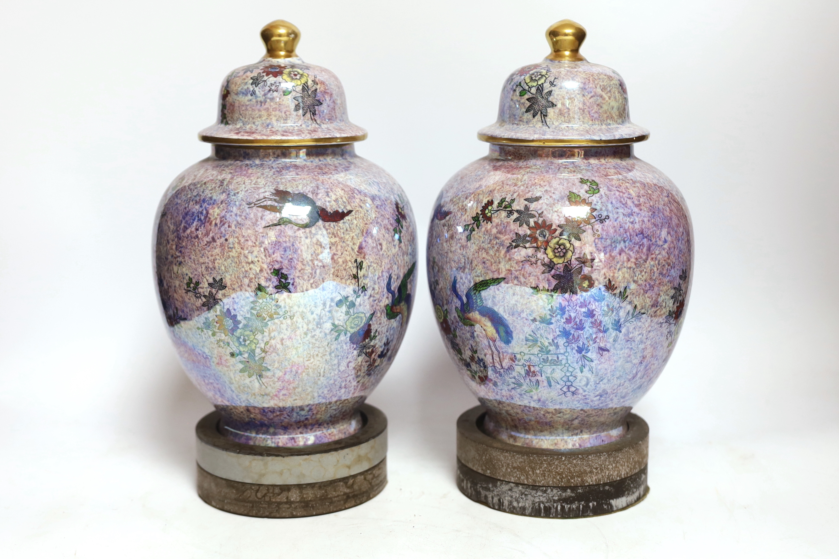 A pair of Wilton ware lustre glazed lidded vases on stands and a Losol vase (3) tallest 30cm